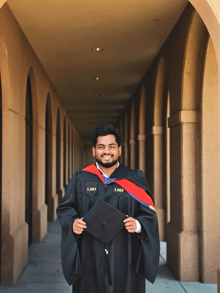 MD Shafikul Islam in graduation gown at LSU after earning the M.S.