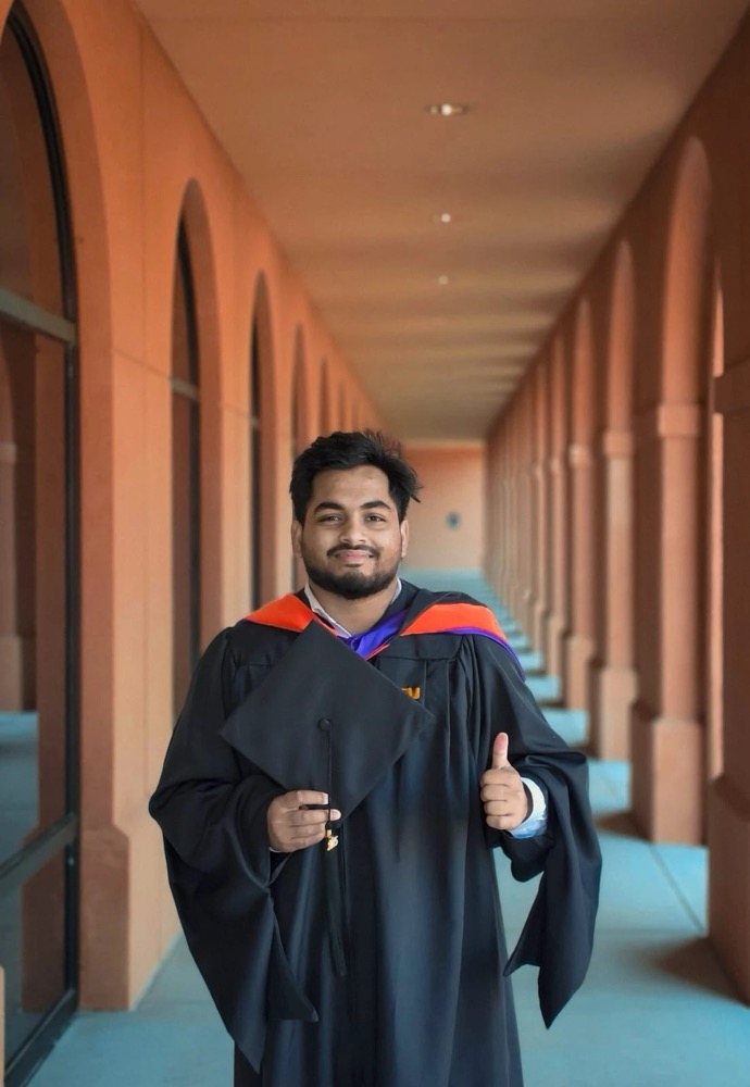 MD Shafikul Islam at LSU graduation, holding his cap